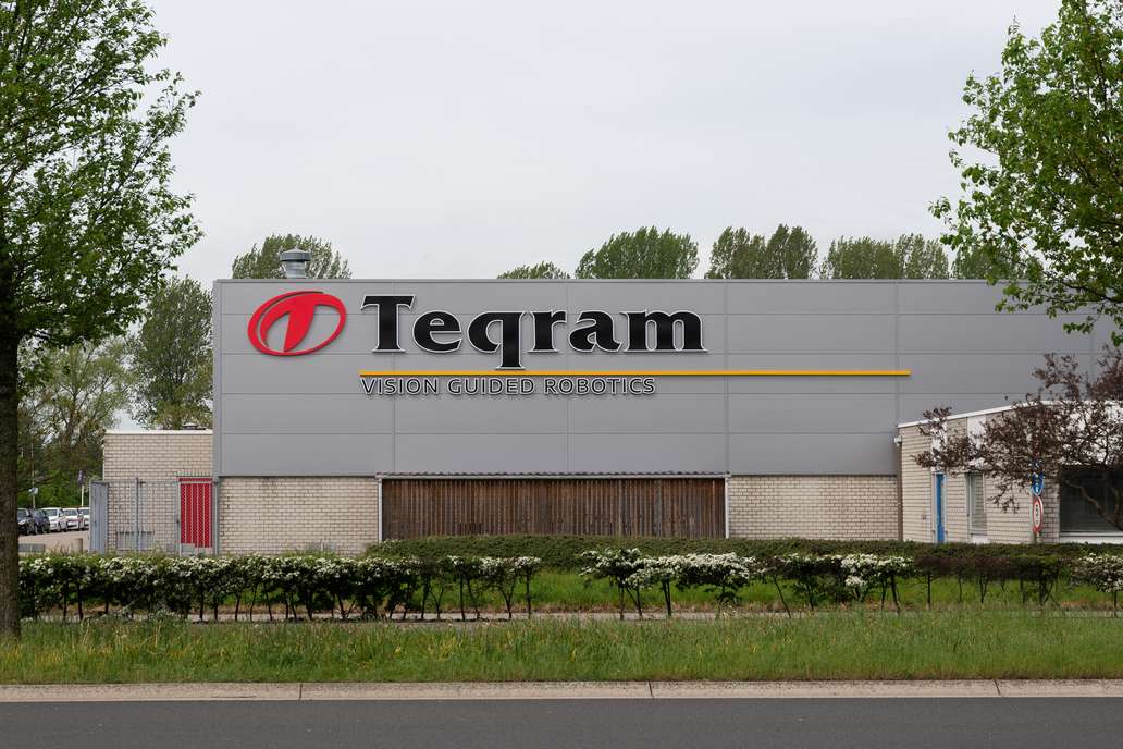 Outside view on the Teqram Building with the logo on the building
