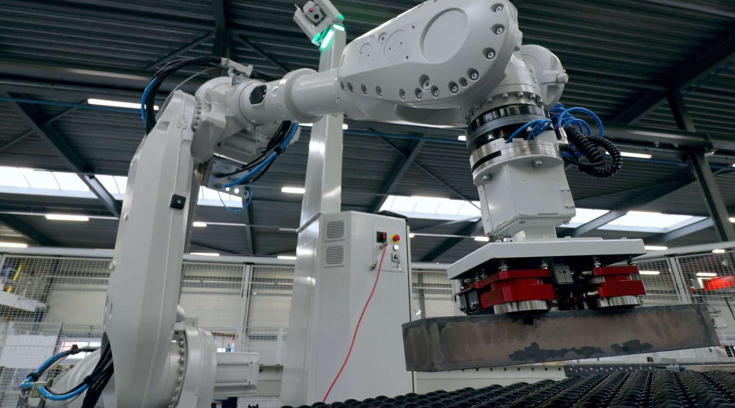 EasyBot picked up a heavy steel product with a magnetic gripper