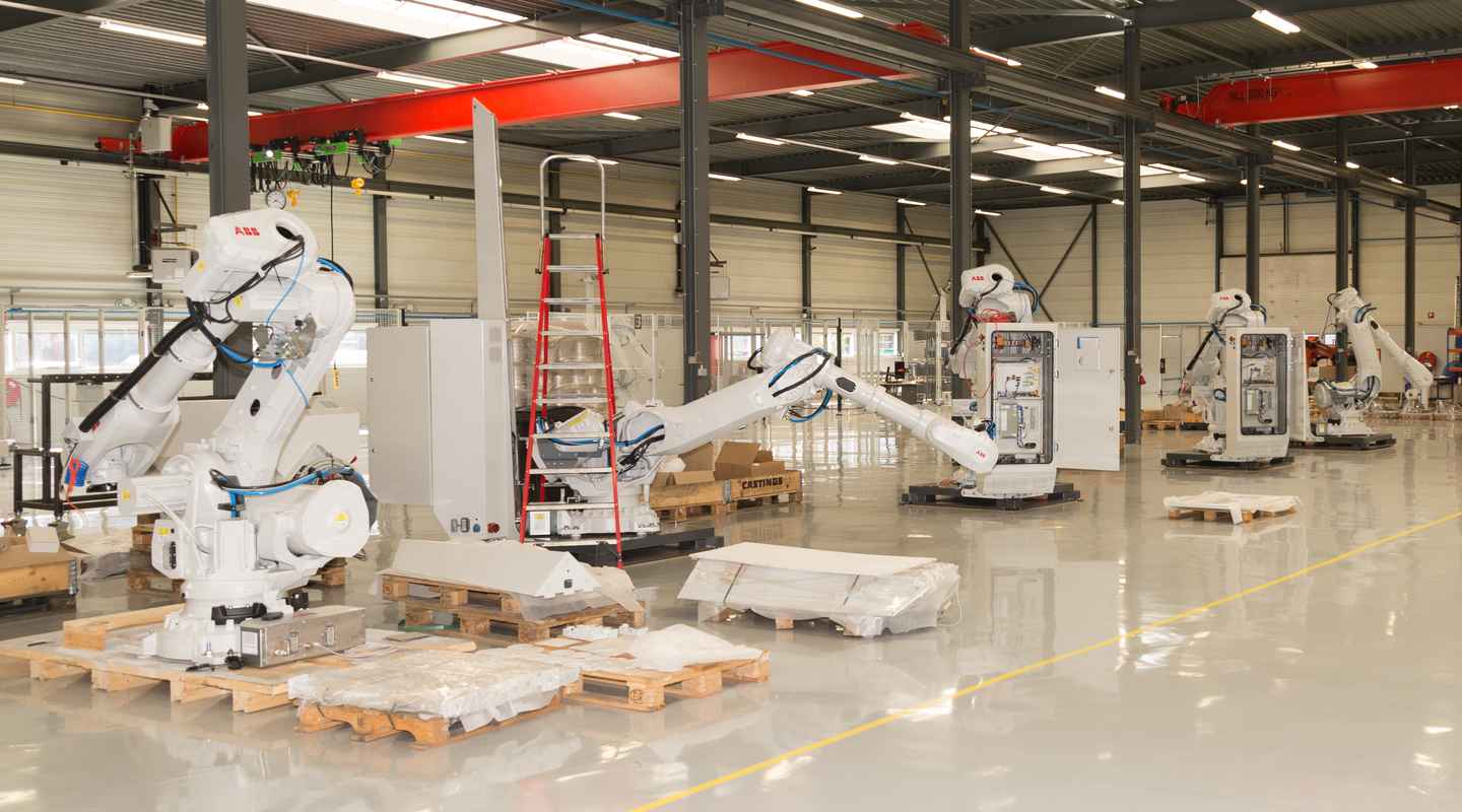 Inside view of the Teqram production area with multiple robots